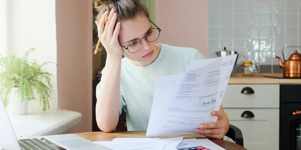 women stressed with debts